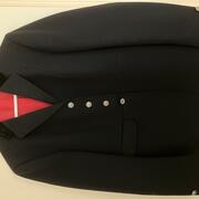 Drie zwarte wedstrijdjasjes Pikeur en Eurostar