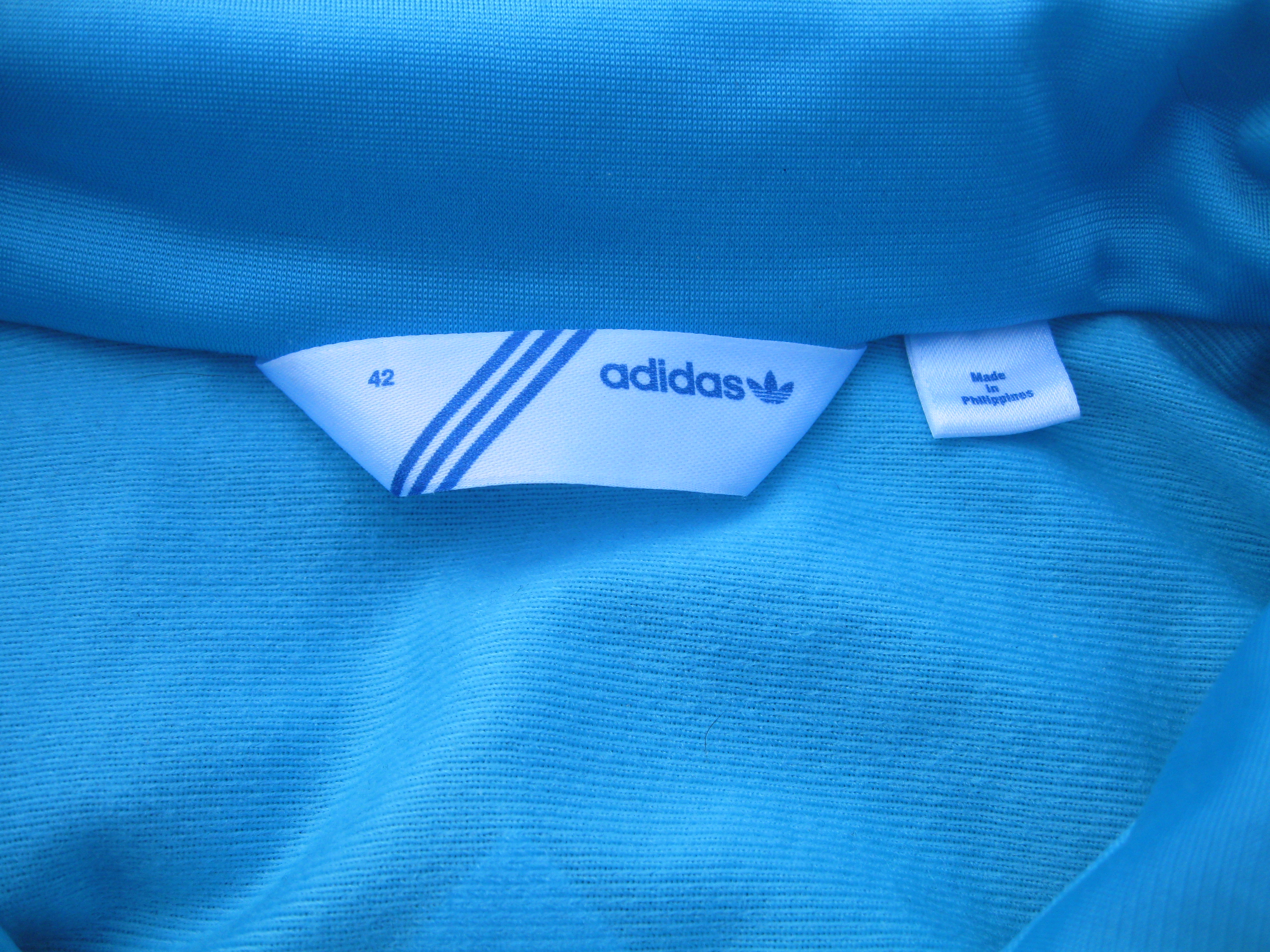 Klokje Van toepassing zijn chirurg Adidas vest dames maat 42 valt als 38 blauw/wit | Bokt.nl