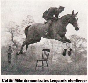 Col Sir Mike Ansell demonstrates Leopard's obedience.jpeg